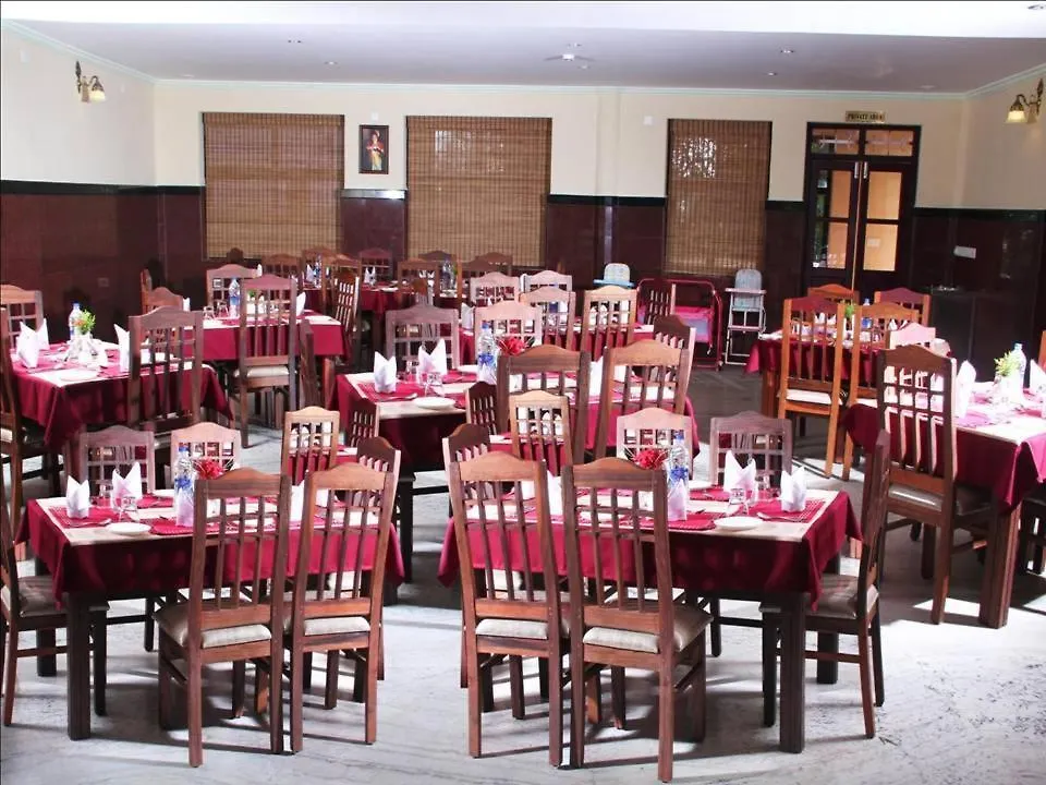 Nirmallyam Residency Hotel Edappal